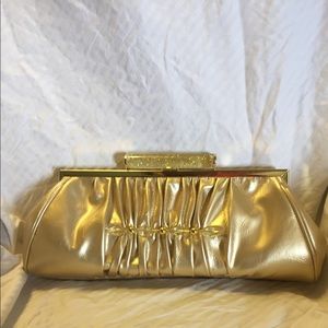 Vintage gold leather clutch handbag